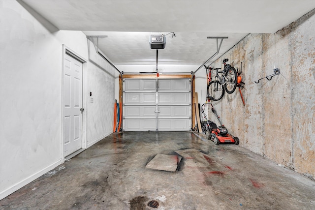 garage featuring a garage door opener