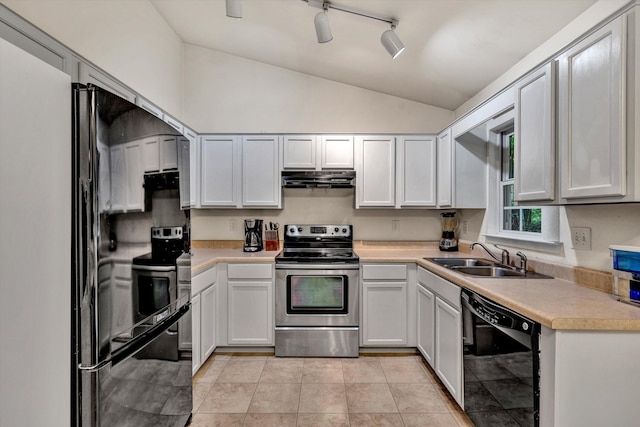 kitchen with electric stove, vaulted ceiling, dishwasher, sink, and light tile patterned floors