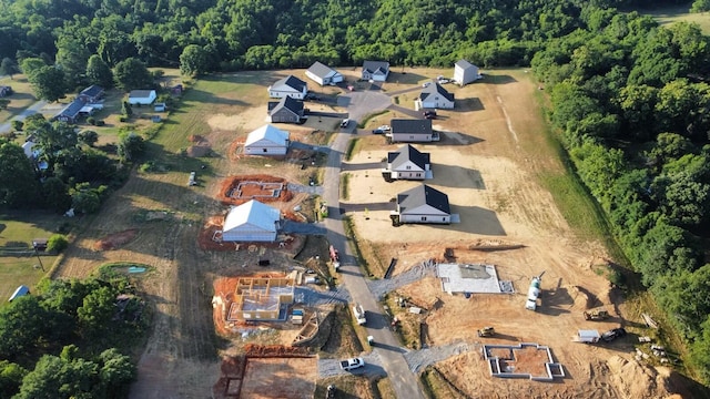 aerial view featuring a wooded view