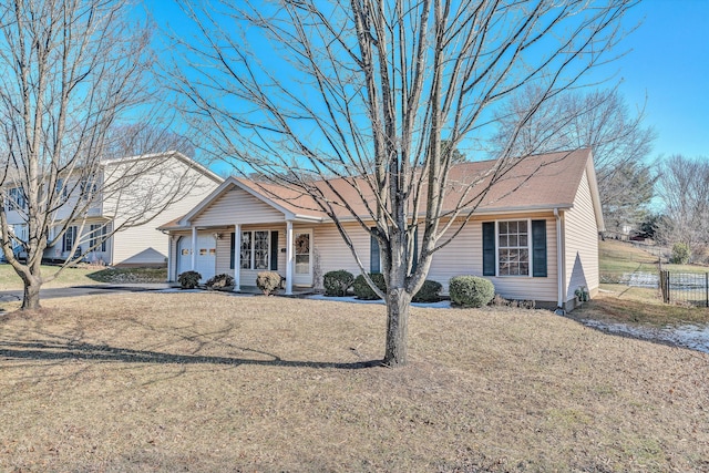 ranch-style home with a porch and a front yard