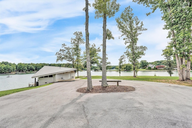 exterior space with a water view