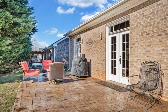 view of patio featuring french doors