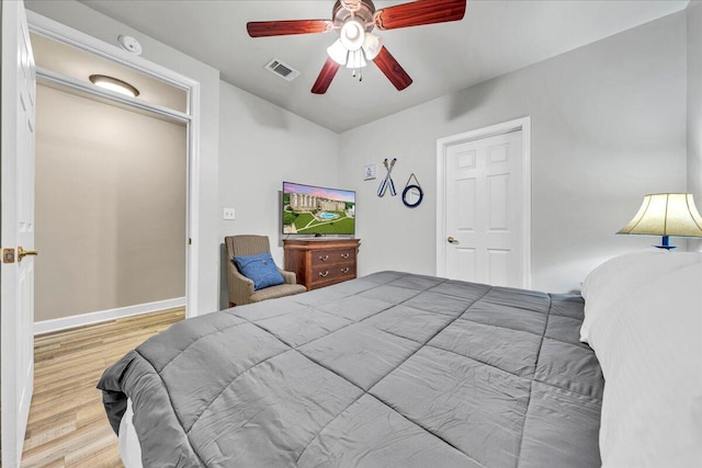 bedroom featuring ceiling fan and wood-type flooring