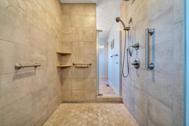 bathroom with tiled shower