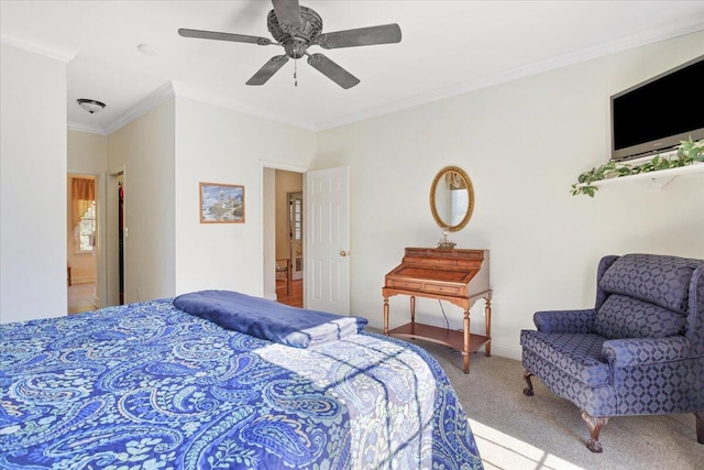 bedroom featuring crown molding, ceiling fan, and carpet