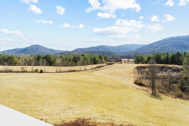 property view of mountains featuring a rural view