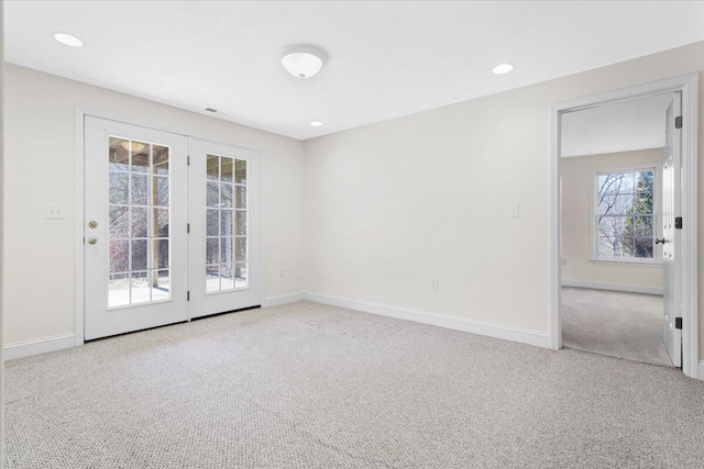 empty room with carpet flooring