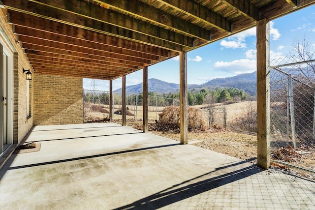 view of patio with a mountain view