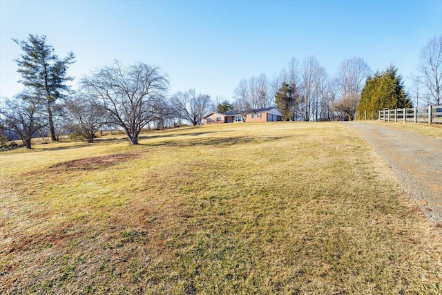 view of yard with a rural view