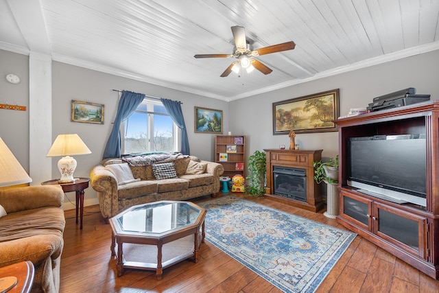 living room featuring ceiling fan, ornamental molding, wood ceiling, and wood-type flooring