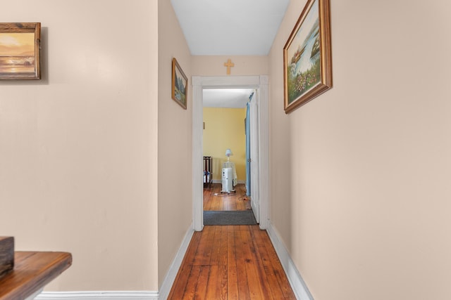 hallway featuring hardwood / wood-style floors