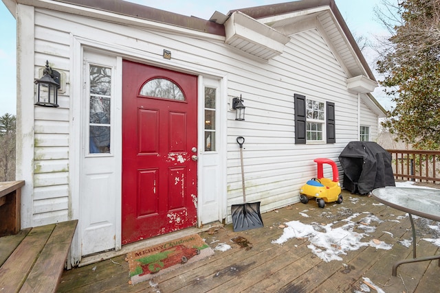 doorway to property with a wooden deck