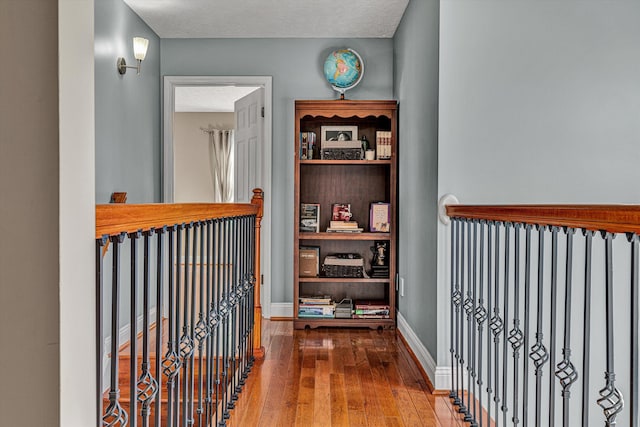 hallway featuring hardwood / wood-style flooring