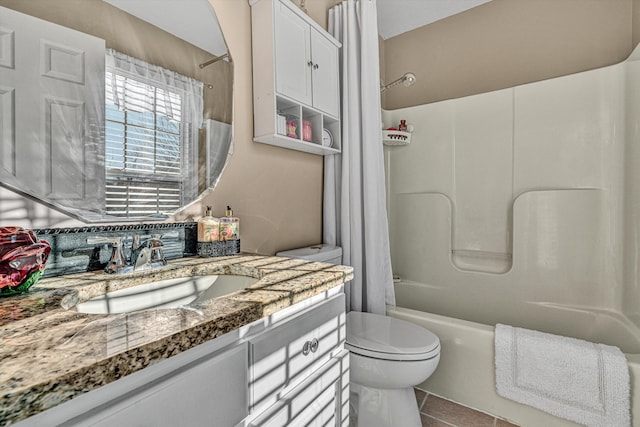 full bathroom with vanity, toilet, shower / tub combo with curtain, and tile patterned flooring