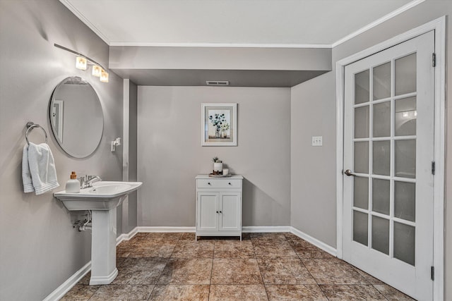 bathroom with crown molding