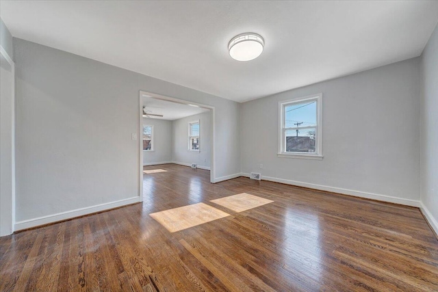 spare room featuring hardwood / wood-style floors