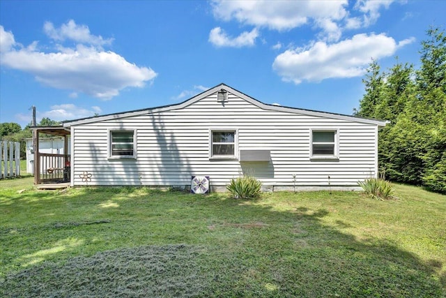 view of property exterior featuring a yard