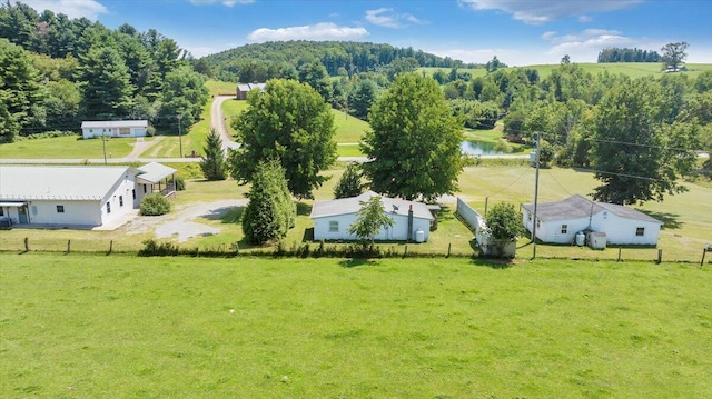 aerial view featuring a rural view and a water view