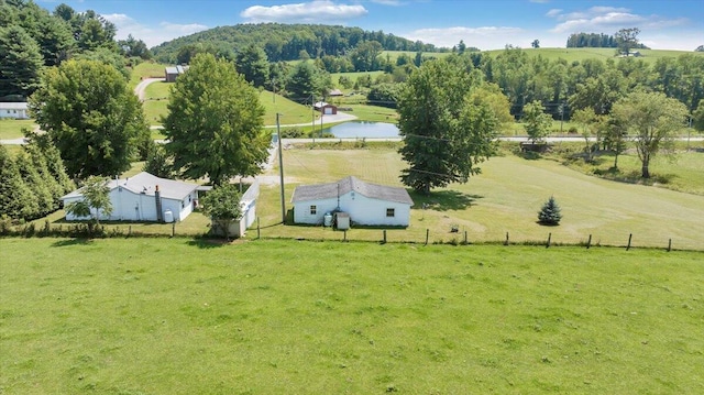 aerial view with a water view and a rural view