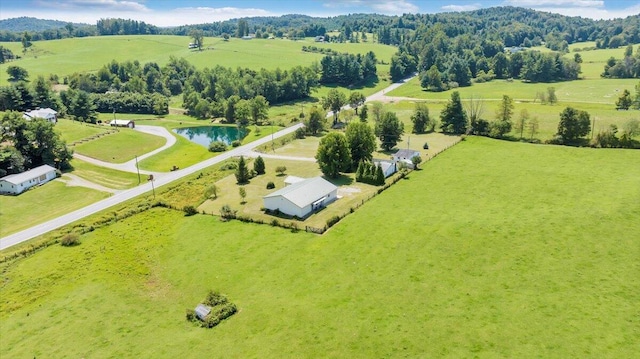 bird's eye view with a rural view and a water view