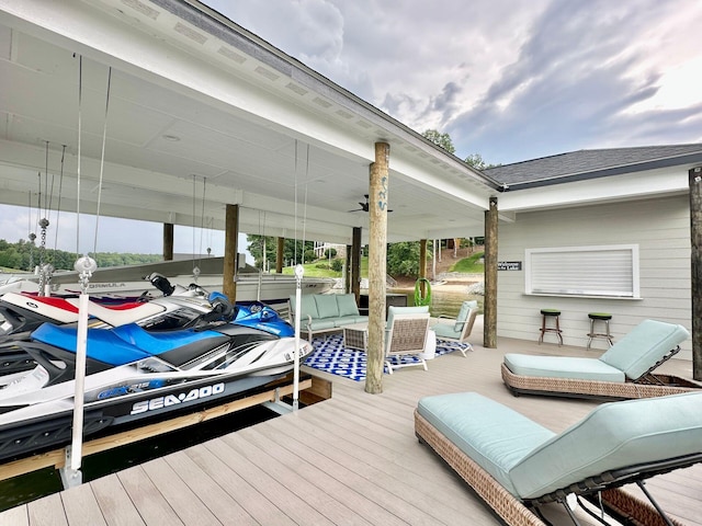 view of dock with outdoor lounge area