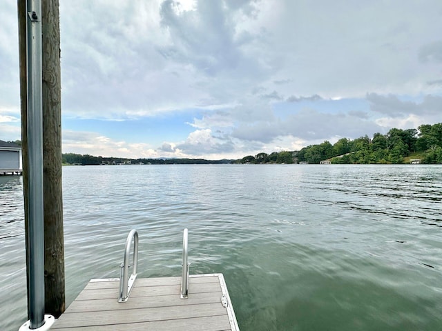 view of dock with a water view
