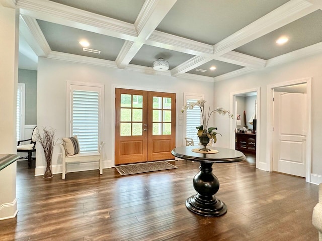 foyer entrance featuring beamed ceiling, crown molding, coffered ceiling, french doors, and dark hardwood / wood-style floors
