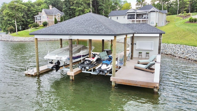 dock area with a water view