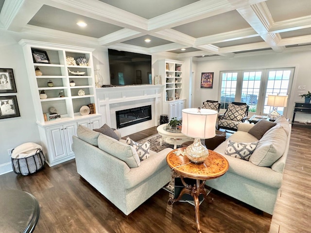 living room with beamed ceiling, ornamental molding, and dark hardwood / wood-style floors