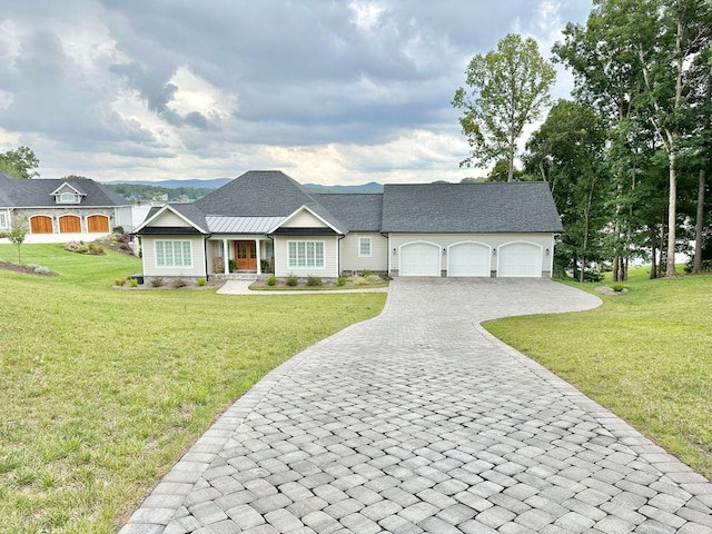 ranch-style home with a garage and a front yard