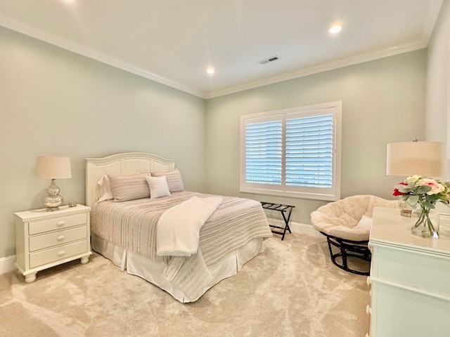 carpeted bedroom featuring crown molding