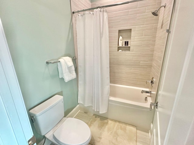 bathroom with toilet and shower / bath combination with curtain