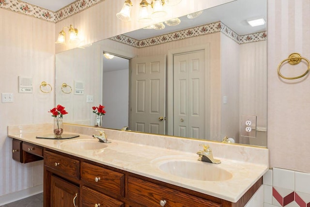 bathroom featuring vanity and tile patterned flooring