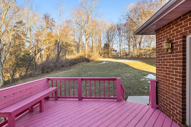 deck featuring a yard