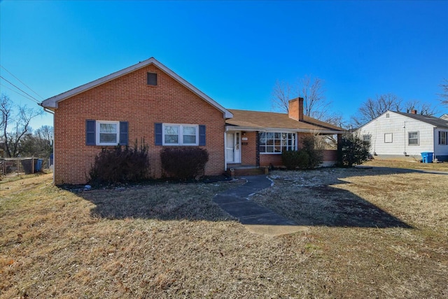 ranch-style house with a front lawn