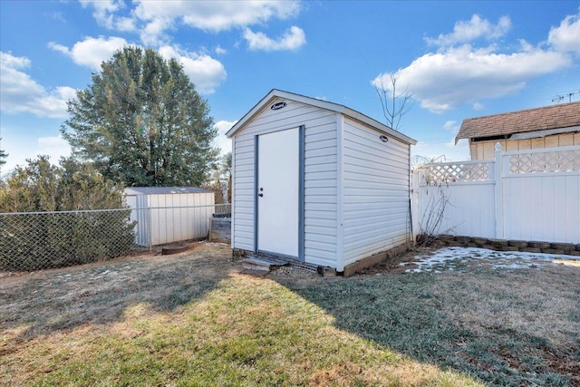 view of outdoor structure with a lawn