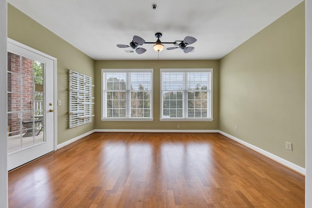 3040 Mcvitty Forest Dr Unit 211, Roanoke, VA 24018 - interior space with a ceiling fan, baseboards, a wealth of natural light, and wood finished floors