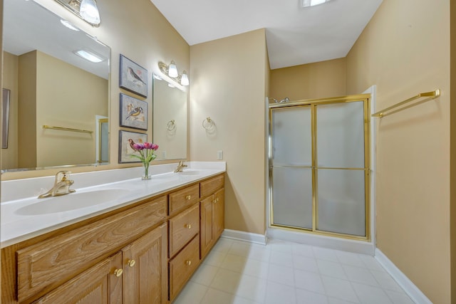 bathroom with walk in shower and vanity