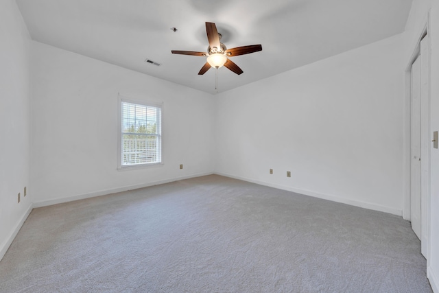 3040 Mcvitty Forest Dr Unit 211, Roanoke, VA 24018 - carpeted spare room featuring visible vents, a ceiling fan, and baseboards