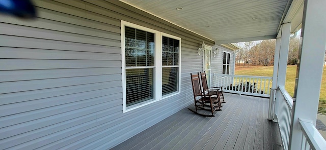 deck with covered porch