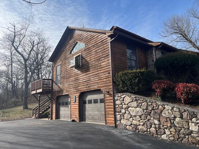 view of home's exterior with a garage