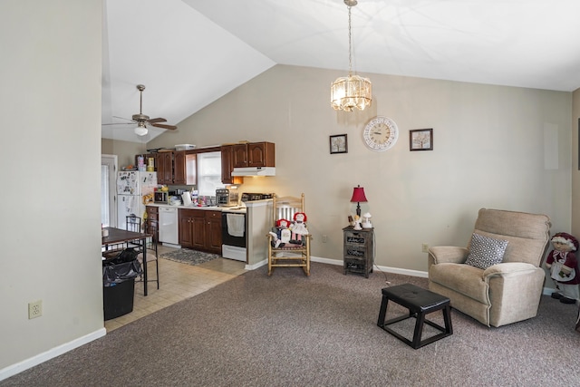 living room featuring ceiling fan with notable chandelier, light colored carpet, and high vaulted ceiling