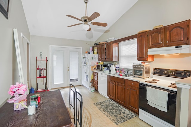 kitchen featuring high vaulted ceiling, sink, ceiling fan, white appliances, and french doors