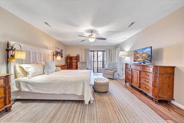 bedroom featuring ceiling fan and light hardwood / wood-style flooring