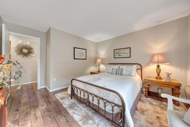 bedroom featuring wood-type flooring