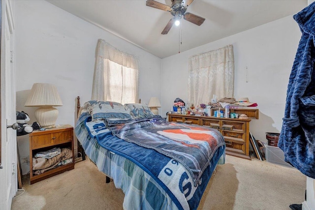 bedroom with light colored carpet and ceiling fan