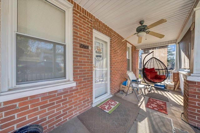 view of patio featuring ceiling fan and covered porch