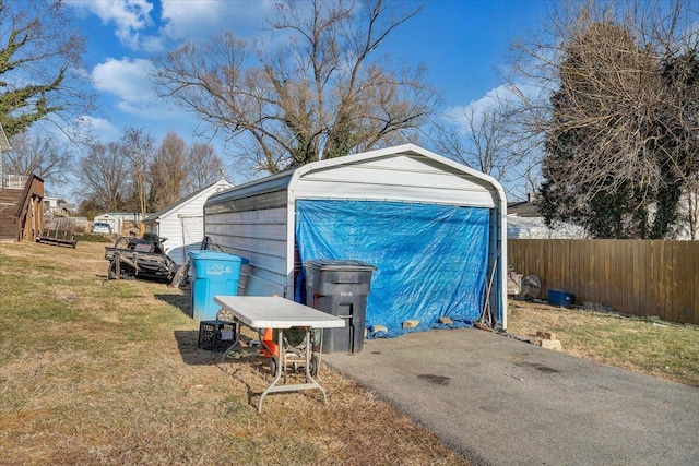 garage with a yard