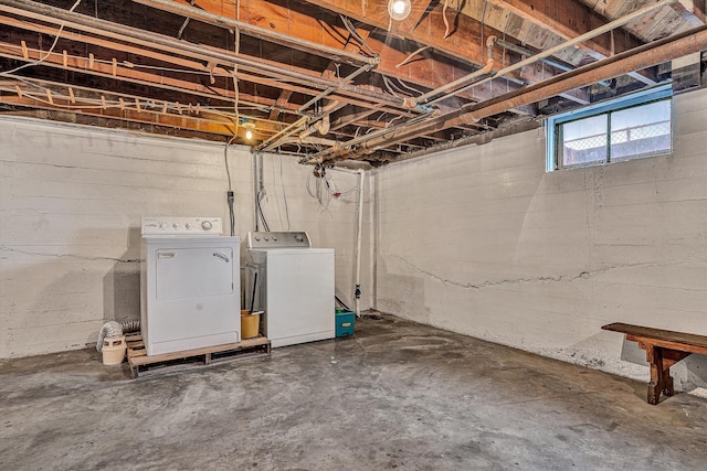 basement with separate washer and dryer