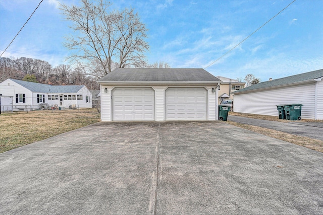 garage with a yard